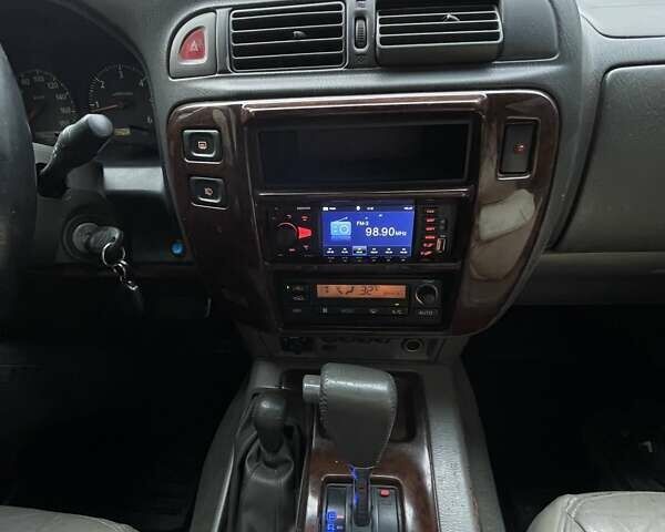 Зелений Ніссан Патрол, об'ємом двигуна 3 л та пробігом 446 тис. км за 15000 $, фото 6 на Automoto.ua