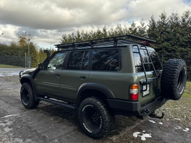 Зелений Ніссан Патрол, об'ємом двигуна 3 л та пробігом 205 тис. км за 4750 $, фото 3 на Automoto.ua