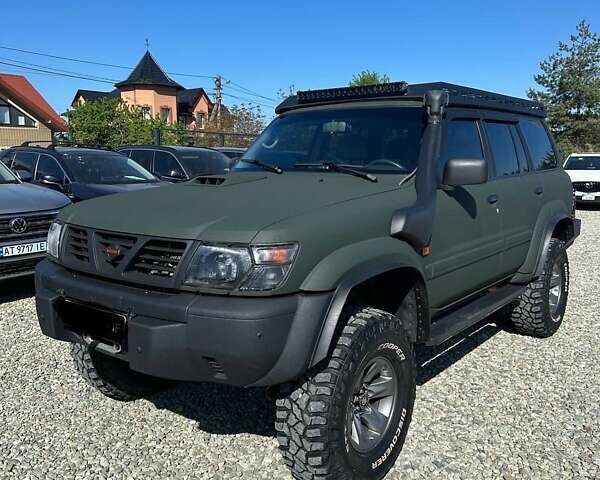 Зеленый Ниссан Патрол, объемом двигателя 2.95 л и пробегом 333 тыс. км за 25000 $, фото 1 на Automoto.ua