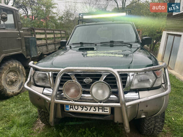 Зеленый Ниссан Патрол, объемом двигателя 2.95 л и пробегом 300 тыс. км за 9800 $, фото 12 на Automoto.ua