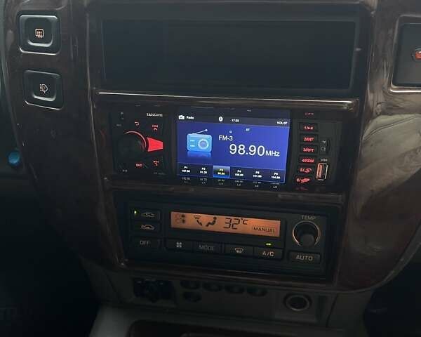 Зелений Ніссан Патрол, об'ємом двигуна 3 л та пробігом 446 тис. км за 15000 $, фото 14 на Automoto.ua