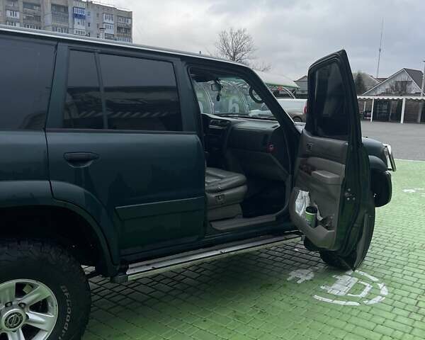 Зелений Ніссан Патрол, об'ємом двигуна 3 л та пробігом 446 тис. км за 15000 $, фото 7 на Automoto.ua