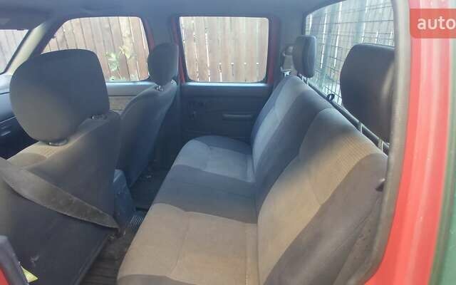 Красный Ниссан Пикап, объемом двигателя 2.5 л и пробегом 286 тыс. км за 5065 $, фото 11 на Automoto.ua