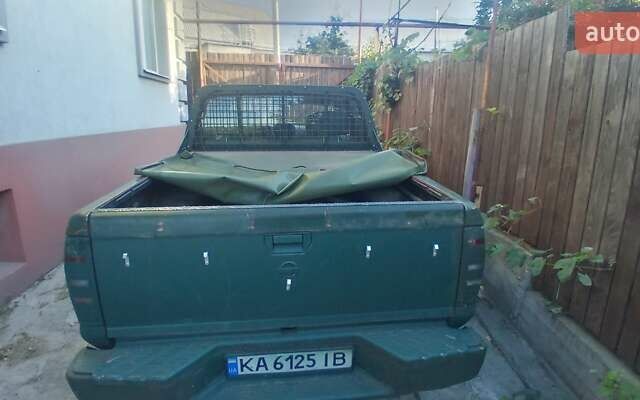 Красный Ниссан Пикап, объемом двигателя 2.5 л и пробегом 286 тыс. км за 5065 $, фото 13 на Automoto.ua