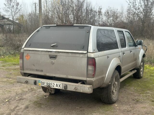 Серый Ниссан Пикап, объемом двигателя 2.5 л и пробегом 339 тыс. км за 5000 $, фото 2 на Automoto.ua