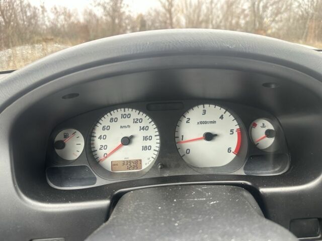 Серый Ниссан Пикап, объемом двигателя 2.5 л и пробегом 339 тыс. км за 5000 $, фото 5 на Automoto.ua