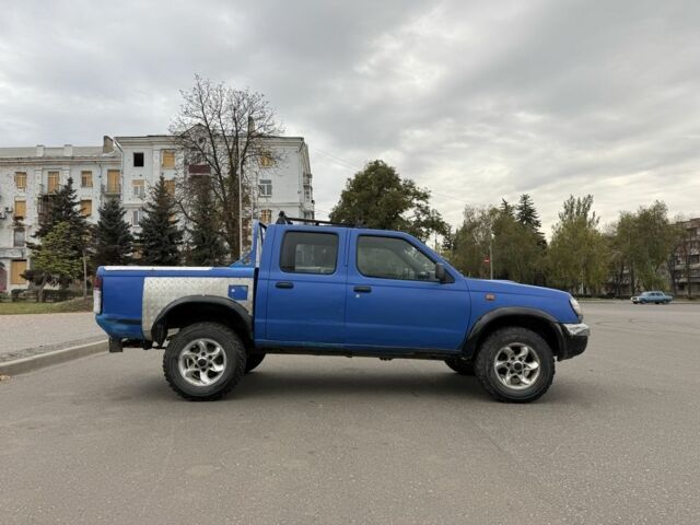 Синій Ніссан Пікап, об'ємом двигуна 2.5 л та пробігом 300 тис. км за 4300 $, фото 1 на Automoto.ua
