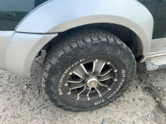 Зелений Ніссан Пікап, об'ємом двигуна 2.5 л та пробігом 300 тис. км за 6426 $, фото 11 на Automoto.ua