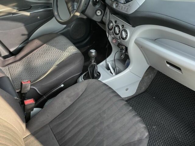 Белый Ниссан Пиксо, объемом двигателя 1 л и пробегом 208 тыс. км за 3500 $, фото 6 на Automoto.ua