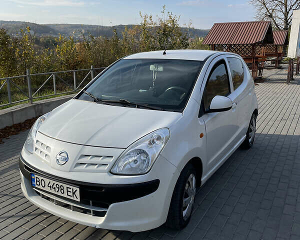 Белый Ниссан Пиксо, объемом двигателя 1 л и пробегом 206 тыс. км за 3500 $, фото 4 на Automoto.ua