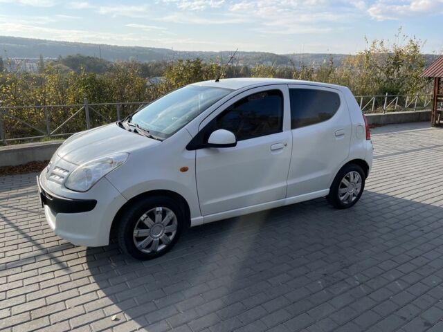 Белый Ниссан Пиксо, объемом двигателя 1 л и пробегом 208 тыс. км за 3500 $, фото 13 на Automoto.ua