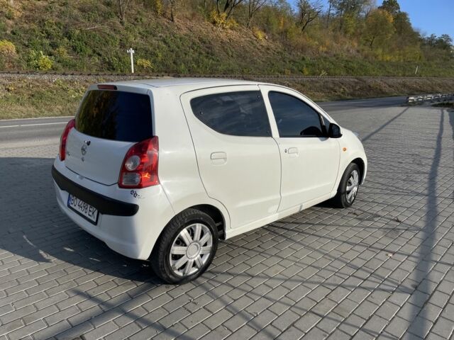 Белый Ниссан Пиксо, объемом двигателя 1 л и пробегом 208 тыс. км за 3500 $, фото 11 на Automoto.ua