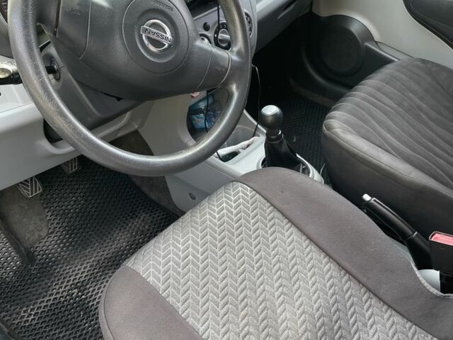 Белый Ниссан Пиксо, объемом двигателя 1 л и пробегом 208 тыс. км за 3500 $, фото 2 на Automoto.ua