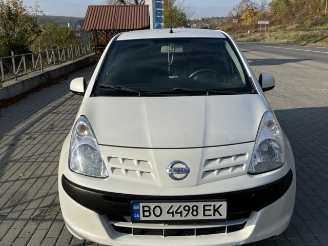 Белый Ниссан Пиксо, объемом двигателя 1 л и пробегом 208 тыс. км за 3500 $, фото 9 на Automoto.ua