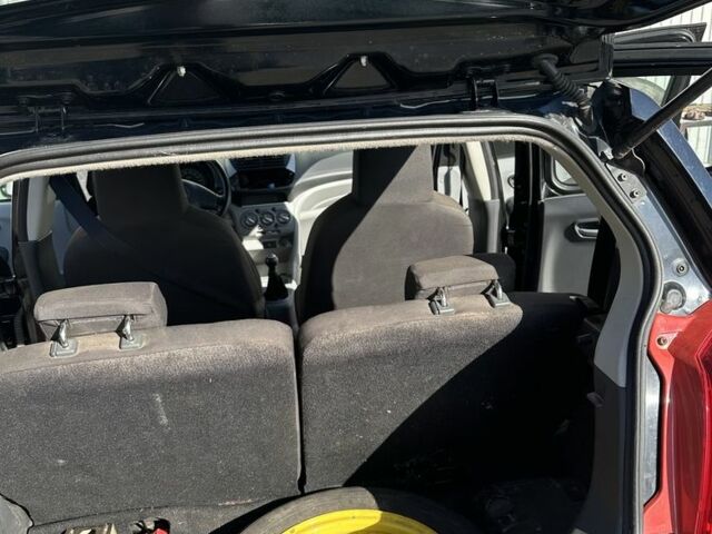 Черный Ниссан Пиксо, объемом двигателя 1 л и пробегом 150 тыс. км за 3300 $, фото 4 на Automoto.ua