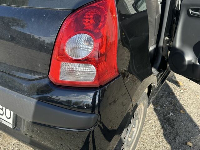 Черный Ниссан Пиксо, объемом двигателя 1 л и пробегом 150 тыс. км за 3300 $, фото 2 на Automoto.ua