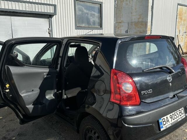 Черный Ниссан Пиксо, объемом двигателя 1 л и пробегом 150 тыс. км за 3300 $, фото 5 на Automoto.ua