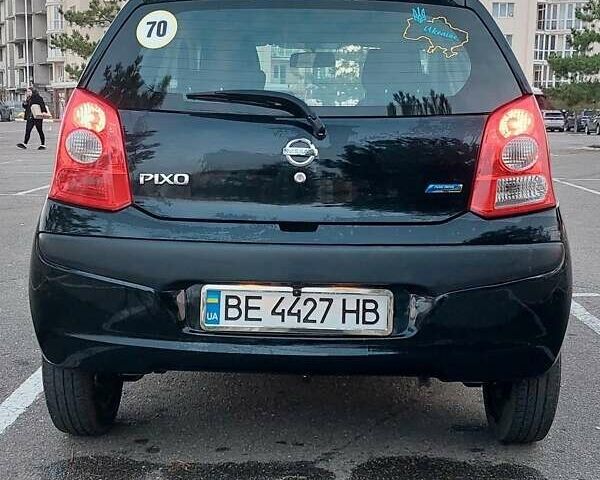 Черный Ниссан Пиксо, объемом двигателя 1 л и пробегом 49 тыс. км за 6000 $, фото 2 на Automoto.ua
