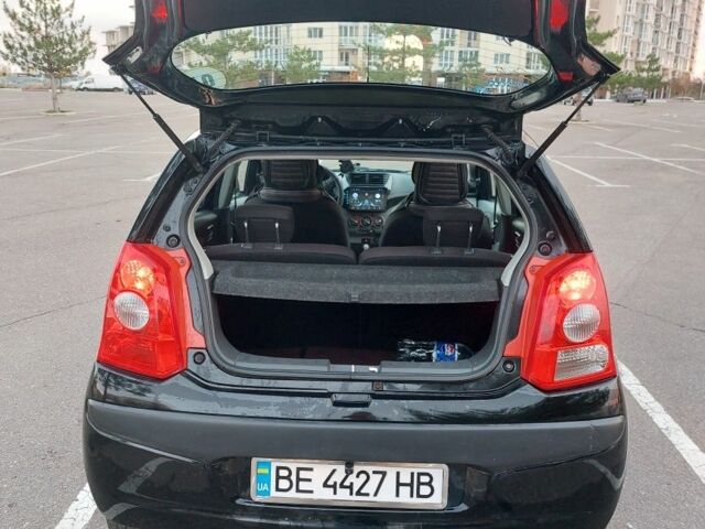 Черный Ниссан Пиксо, объемом двигателя 1 л и пробегом 49 тыс. км за 6000 $, фото 4 на Automoto.ua