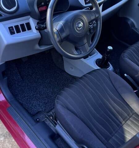 Червоний Ніссан Піксо, об'ємом двигуна 1 л та пробігом 183 тис. км за 3900 $, фото 14 на Automoto.ua