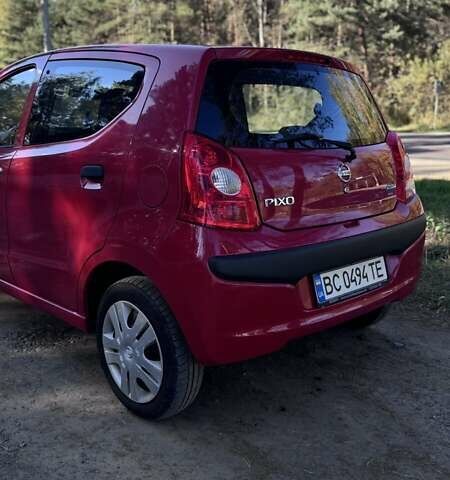 Червоний Ніссан Піксо, об'ємом двигуна 1 л та пробігом 183 тис. км за 3900 $, фото 4 на Automoto.ua