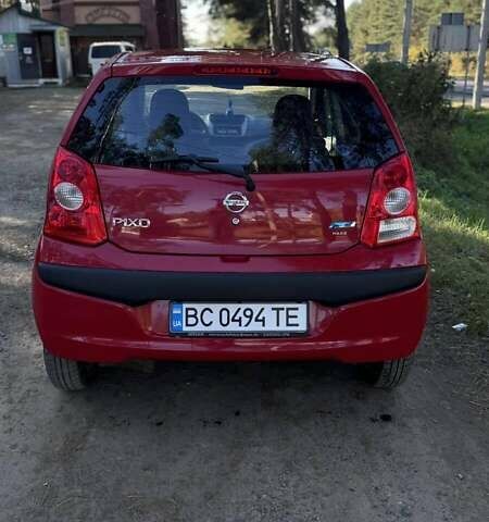Червоний Ніссан Піксо, об'ємом двигуна 1 л та пробігом 183 тис. км за 3900 $, фото 5 на Automoto.ua