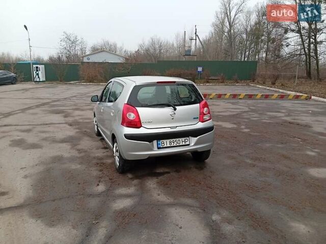 Серый Ниссан Пиксо, объемом двигателя 1 л и пробегом 139 тыс. км за 3400 $, фото 3 на Automoto.ua