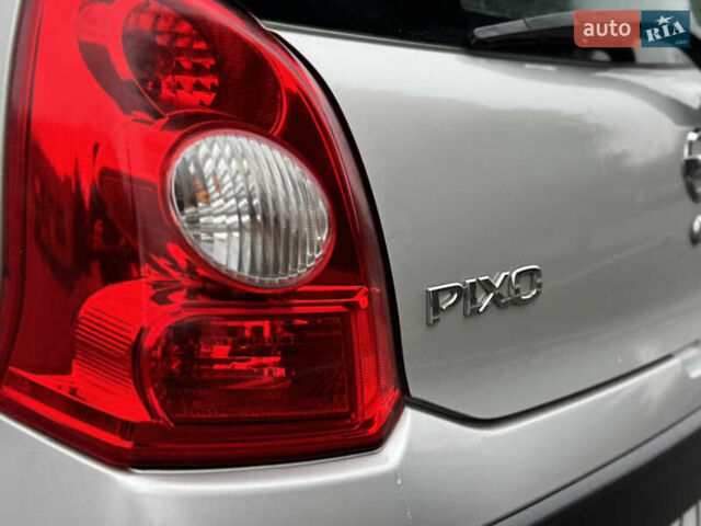 Серый Ниссан Пиксо, объемом двигателя 1 л и пробегом 210 тыс. км за 3550 $, фото 21 на Automoto.ua