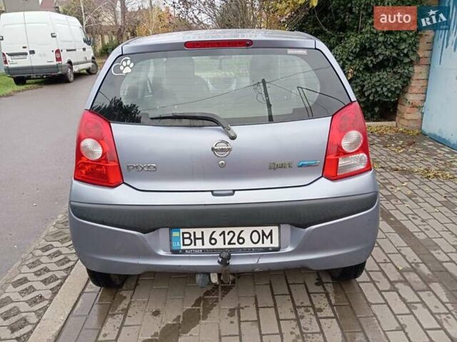 Синий Ниссан Пиксо, объемом двигателя 1 л и пробегом 170 тыс. км за 3500 $, фото 1 на Automoto.ua