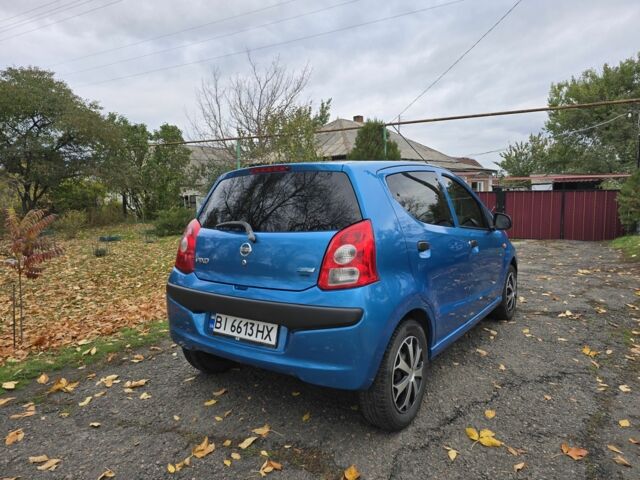 Синий Ниссан Пиксо, объемом двигателя 1 л и пробегом 114 тыс. км за 3999 $, фото 4 на Automoto.ua