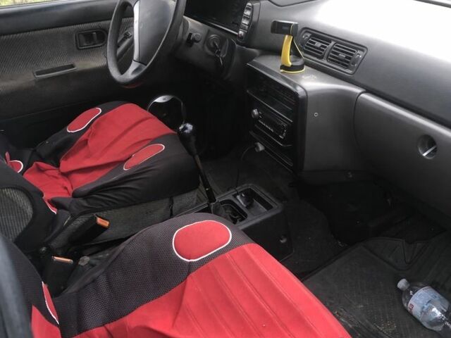 Белый Ниссан Прерия, объемом двигателя 2 л и пробегом 500 тыс. км за 900 $, фото 7 на Automoto.ua