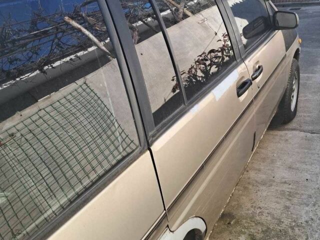 Бежевий Ніссан Прерія, об'ємом двигуна 2 л та пробігом 280 тис. км за 2000 $, фото 2 на Automoto.ua