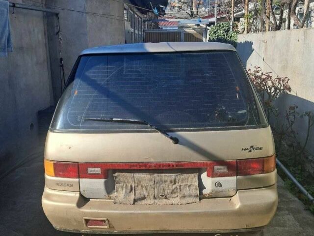 Бежевий Ніссан Прерія, об'ємом двигуна 2 л та пробігом 280 тис. км за 2000 $, фото 1 на Automoto.ua