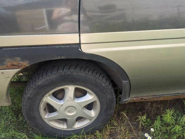 Чорний Ніссан Прерія, об'ємом двигуна 2 л та пробігом 400 тис. км за 750 $, фото 3 на Automoto.ua