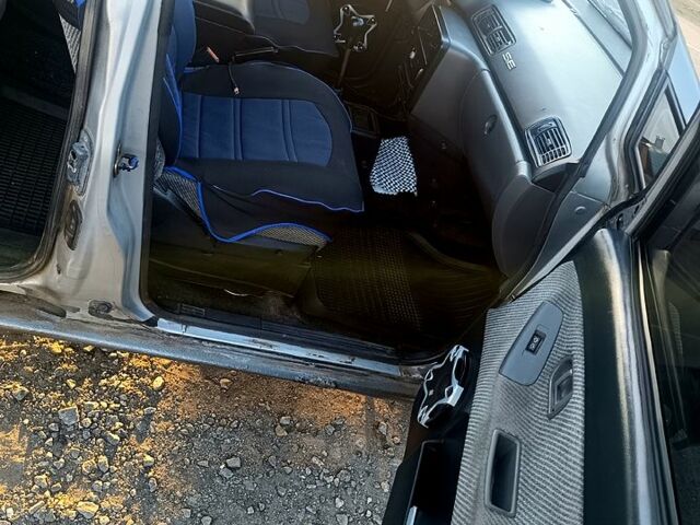 Серый Ниссан Прерия, объемом двигателя 2 л и пробегом 300 тыс. км за 1900 $, фото 2 на Automoto.ua