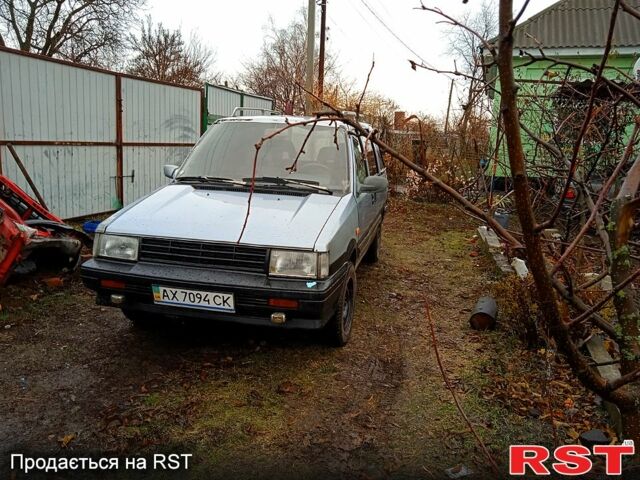 Синій Ніссан Прерія, об'ємом двигуна 2 л та пробігом 100 тис. км за 1100 $, фото 4 на Automoto.ua