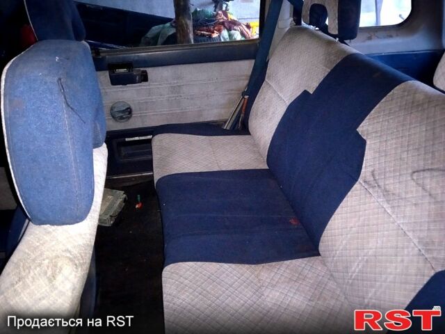 Синій Ніссан Прерія, об'ємом двигуна 2 л та пробігом 100 тис. км за 1100 $, фото 8 на Automoto.ua