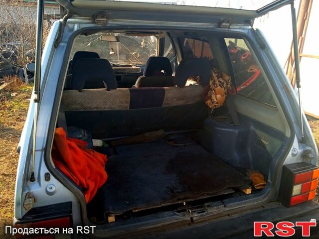 Синій Ніссан Прерія, об'ємом двигуна 2 л та пробігом 100 тис. км за 1100 $, фото 2 на Automoto.ua