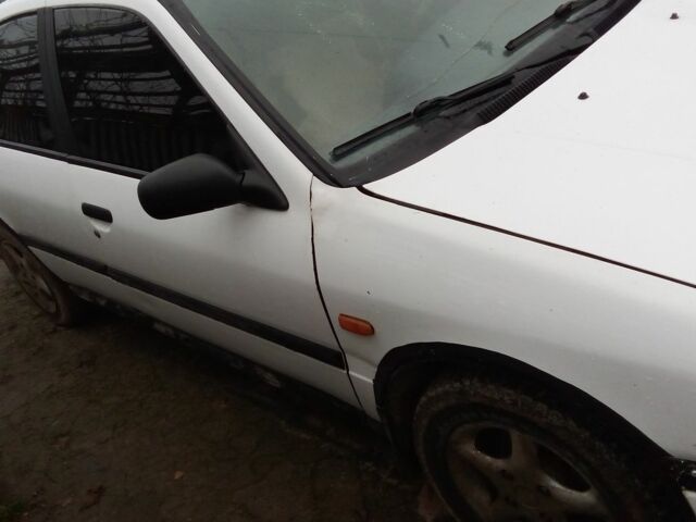 Белый Ниссан Примера, объемом двигателя 1.5 л и пробегом 200 тыс. км за 750 $, фото 2 на Automoto.ua