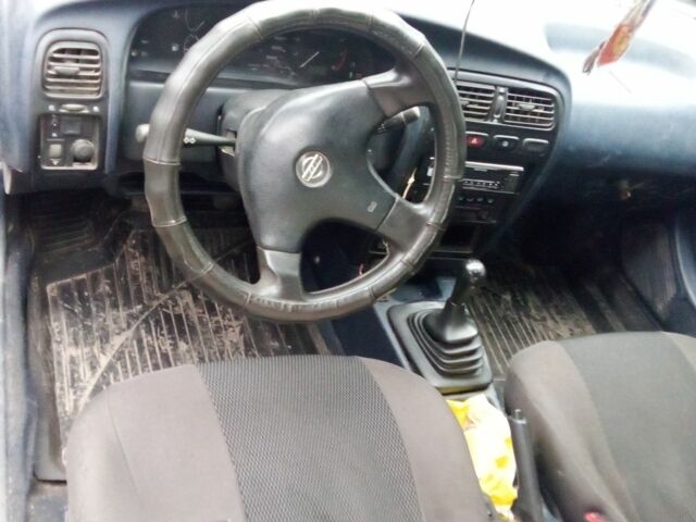 Белый Ниссан Примера, объемом двигателя 1.5 л и пробегом 200 тыс. км за 750 $, фото 1 на Automoto.ua