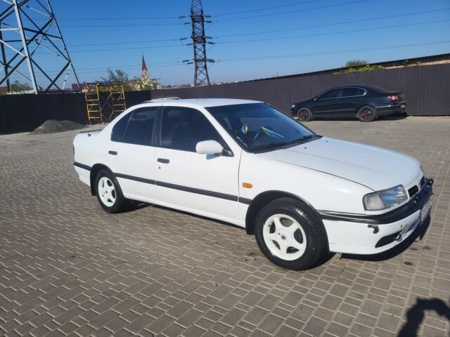 Белый Ниссан Примера, объемом двигателя 1.6 л и пробегом 470 тыс. км за 1800 $, фото 1 на Automoto.ua