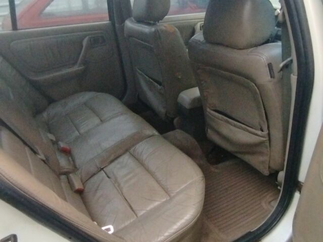 Белый Ниссан Примера, объемом двигателя 2 л и пробегом 250 тыс. км за 592 $, фото 2 на Automoto.ua