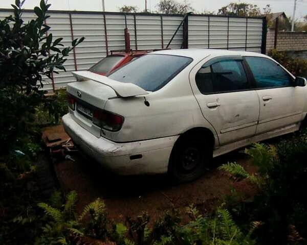 Белый Ниссан Примера, объемом двигателя 2 л и пробегом 250 тыс. км за 592 $, фото 2 на Automoto.ua