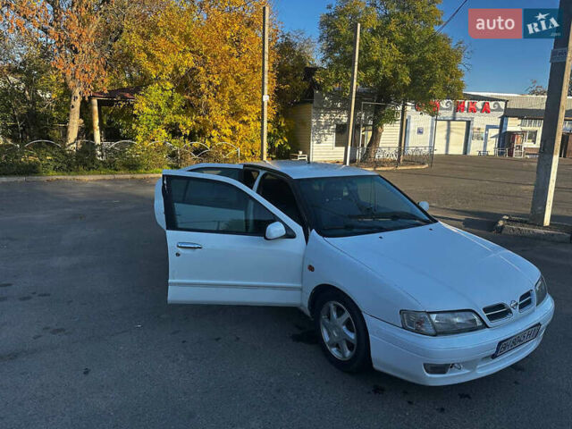 Білий Ніссан Прімера, об'ємом двигуна 2 л та пробігом 392 тис. км за 2700 $, фото 5 на Automoto.ua