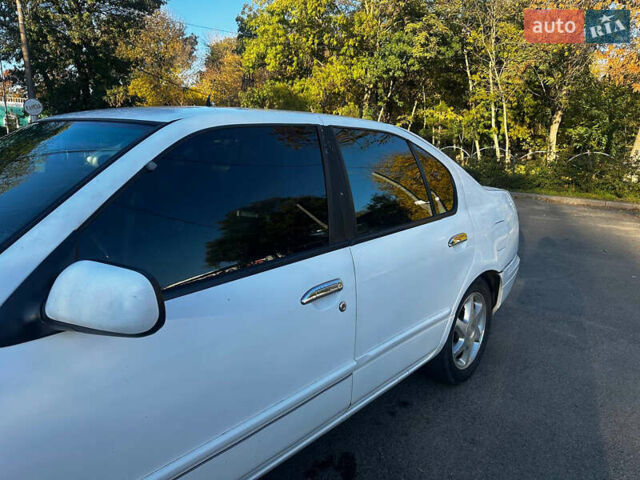 Білий Ніссан Прімера, об'ємом двигуна 2 л та пробігом 392 тис. км за 2700 $, фото 3 на Automoto.ua