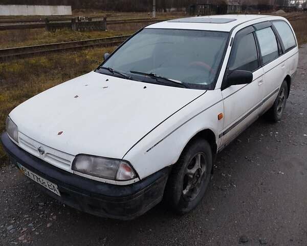 Білий Ніссан Прімера, об'ємом двигуна 2 л та пробігом 409 тис. км за 1200 $, фото 5 на Automoto.ua