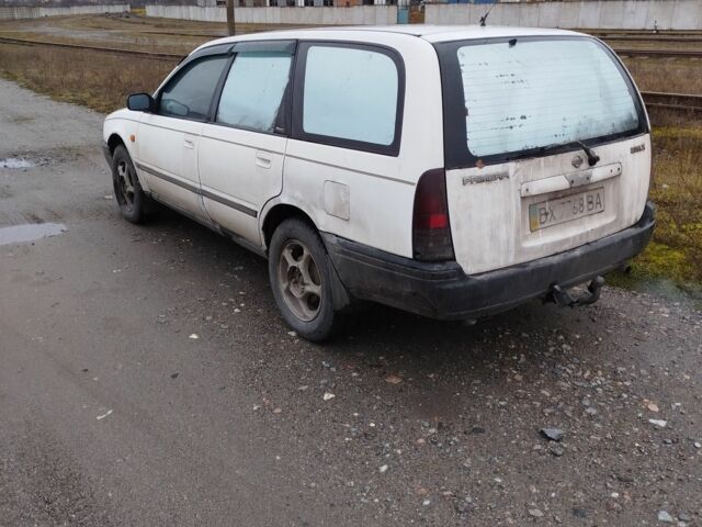 Білий Ніссан Прімера, об'ємом двигуна 2 л та пробігом 409 тис. км за 1200 $, фото 2 на Automoto.ua