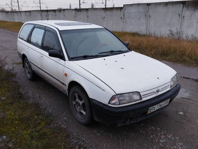 Білий Ніссан Прімера, об'ємом двигуна 2 л та пробігом 409 тис. км за 1200 $, фото 1 на Automoto.ua