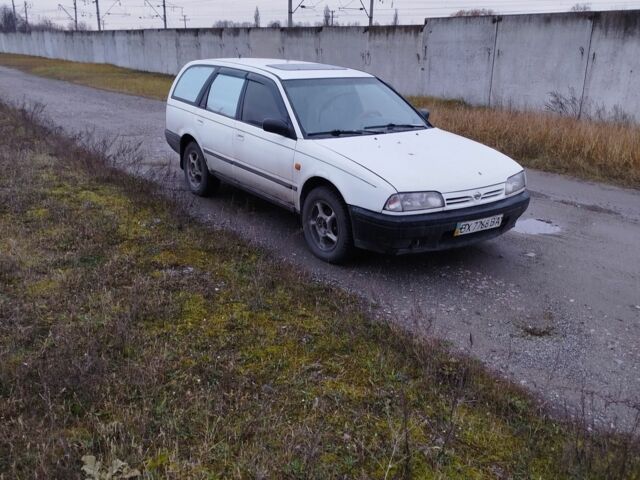 Білий Ніссан Прімера, об'ємом двигуна 2 л та пробігом 409 тис. км за 1200 $, фото 4 на Automoto.ua