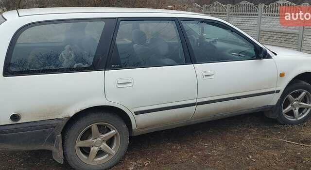 Білий Ніссан Прімера, об'ємом двигуна 2 л та пробігом 270 тис. км за 1000 $, фото 3 на Automoto.ua
